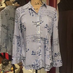 Chico’s peplum button blouse with script print.